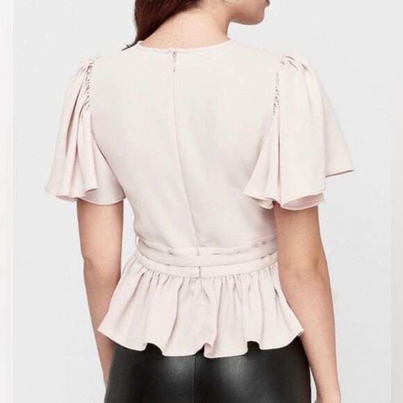 EXPRESS Pale Pink Flutter Sleeve Belted Peplum Blouse - Picture 2 of 10